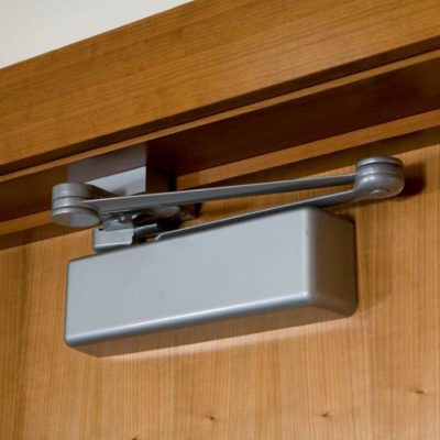 This Is A Photo Of A Door Closer Installed On A Door