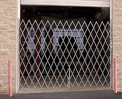 This is a photo of a folding gate installed by Serv-U locksmiths in Springfield, MA